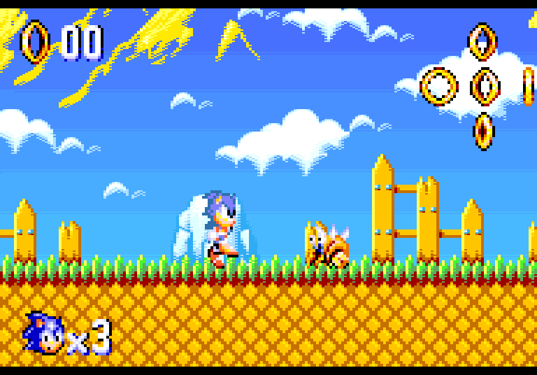 Green Hill Zone: Sonic running along the fence, a Motobug ahead of him and a trail of rings in the sky